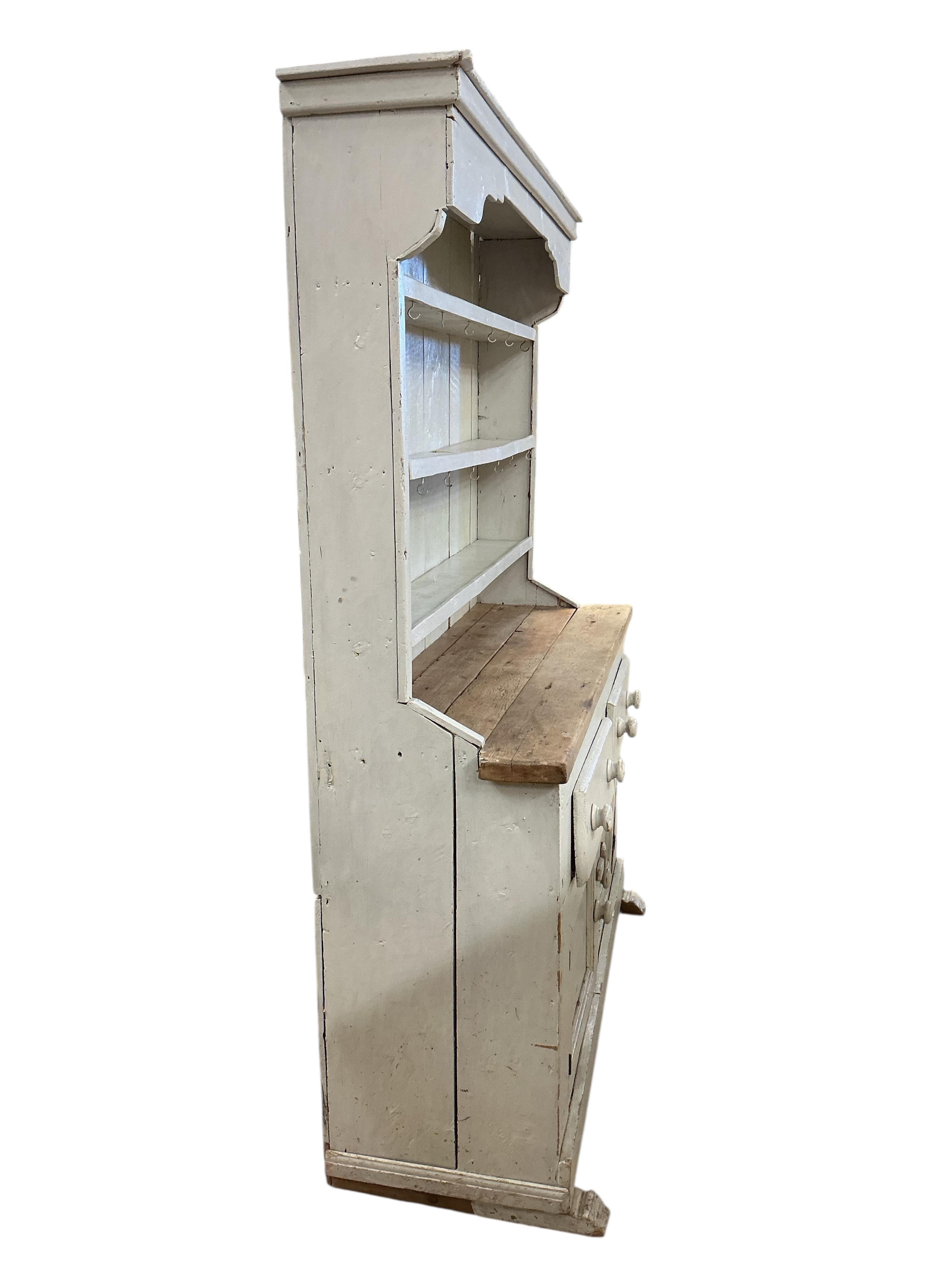 A Victorian style painted pine dresser, width 132cm, depth 43cm, height 182cm - to report